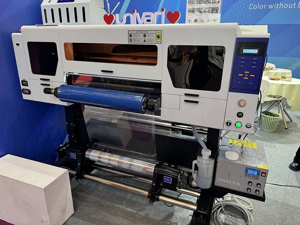 Α2 Α3 Ψηφιακό 60cm DTF αυτοκόλλητο UV εκτυπωτής Γυαλί Μεταλλικός εκτυπωτής με 13200 U1 κεφαλή